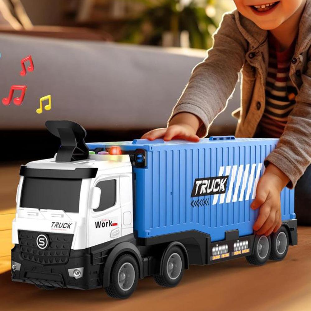 Child playing with a blue and white toy transport truck with lights and music in a living room.