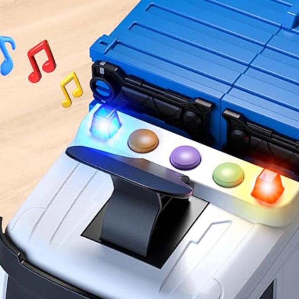 Close-up of a toy transport truck cab with colorful buttons, flashing lights, and music note icons showing sound effects.