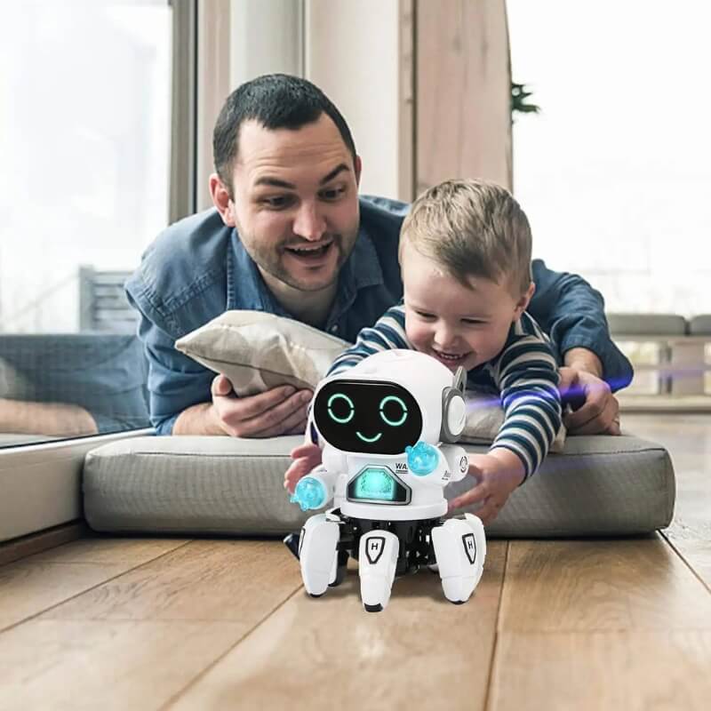 Father and son playing with a white dancing robot toy in the living room and having a laugh.