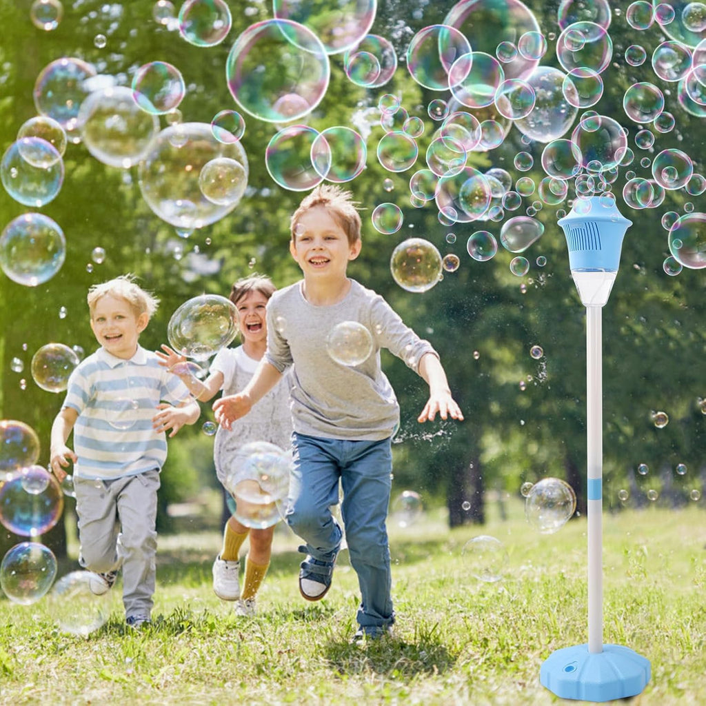 Three children joyfully run through a flurry of bubbles in a sunny park, with a tall blue bubble torch standing nearby producing the bubbles.