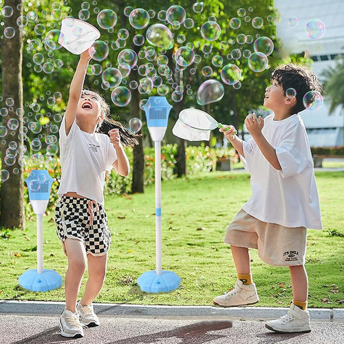 Boy and girl catching bubbles made by the Bubble Torch machine by Smartoon Kids.
