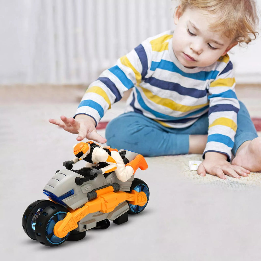 A young child in a striped shirt playing with the futuristic Cyclone Racer toy motorcycle, showing the toy in motion.