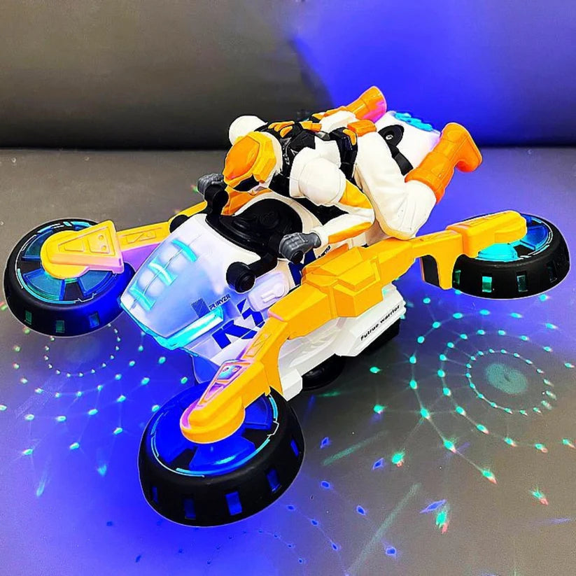 The toy motorcycle in hovering mode with extended wheels, illuminated blue lights, and a futuristic aesthetic, with colorful projected lights on the floor.