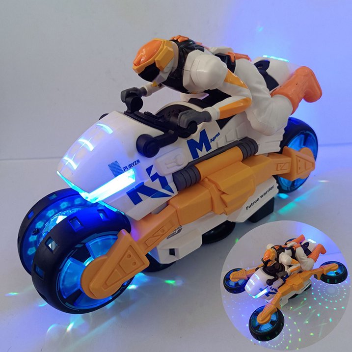 A futuristic toy motorcycle with a rider in a white and orange suit, featuring blue LED wheels and glowing accents. A small inset image shows the motorcycle in action with projected lights on the floor.