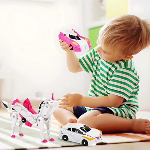Boy playing with Fusion Bots toy, which includes two cars that collide together to make a colorful unicorn.