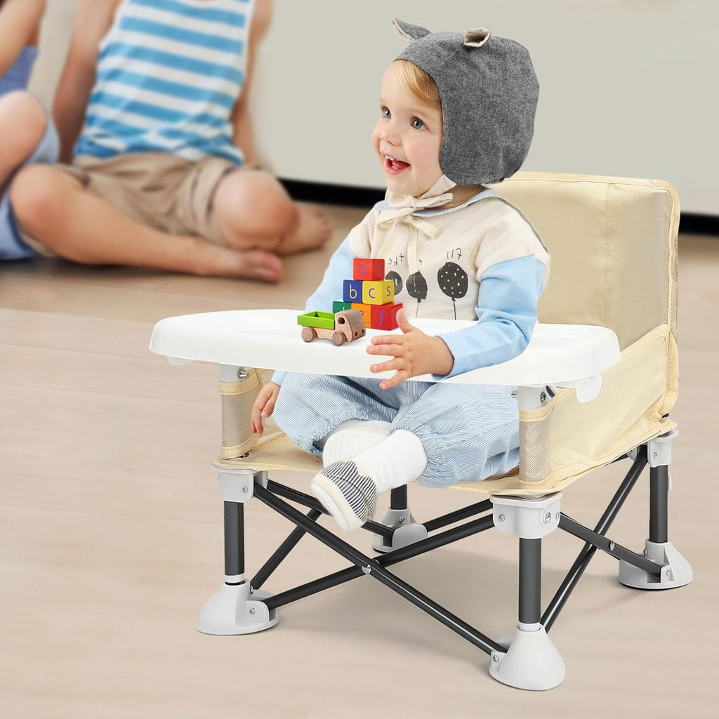 Baby happily sitting in his beige feeding chair by Smartoon Kids.