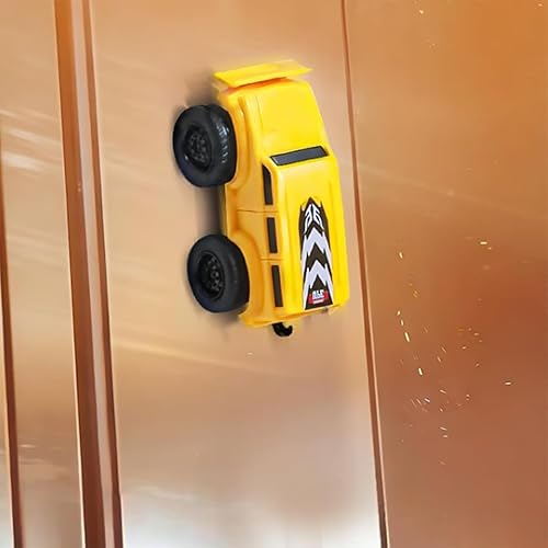 Yellow truck from the Magnetic Racers set for kids climbing the fridge. 