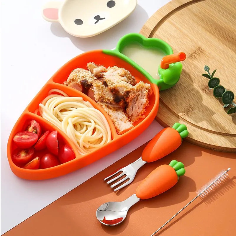 My First Dining Set featuring a carrot-shaped silicone plate, a detachable suction straw, a fork, and a spoon. 