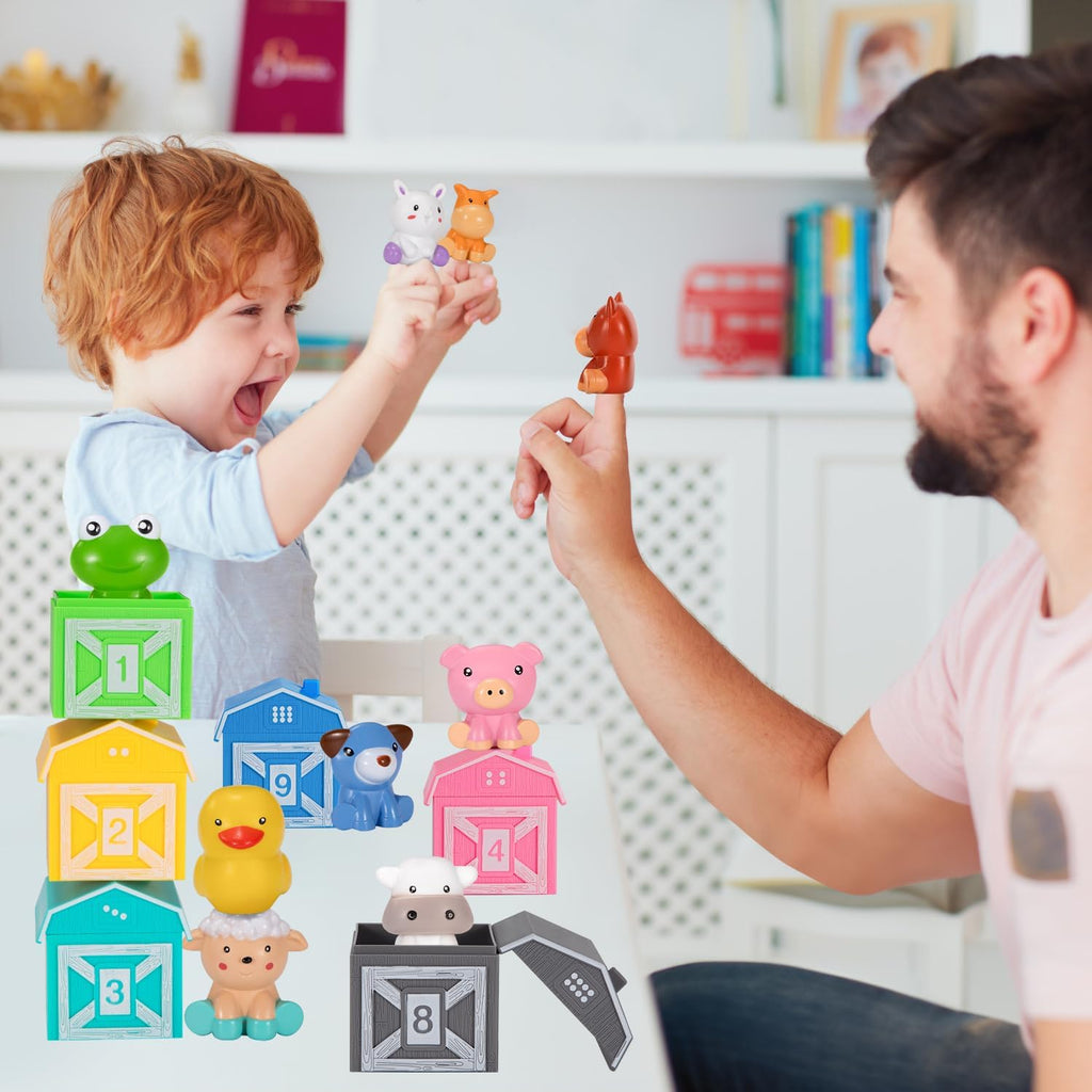 Father and son playing with finger puppet animals featured in the Smart Farm game.