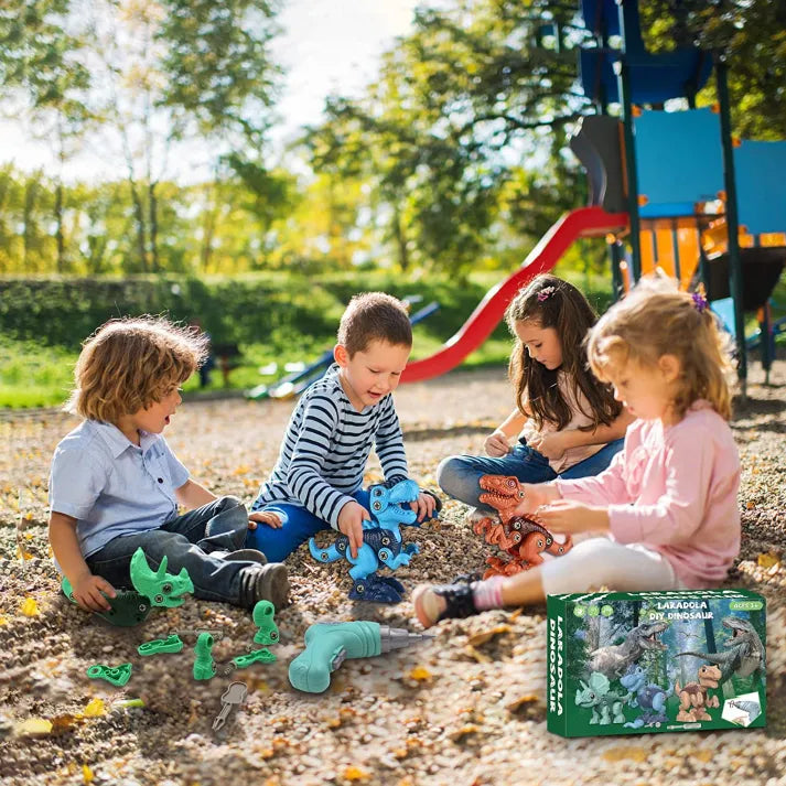 Group of children sitting in the park and playing with the Build a Dino Engineer Set.