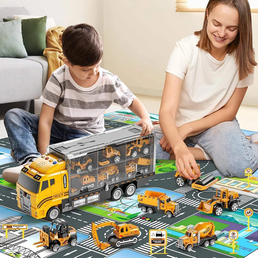 Child and mother playing on a road play mat with yellow construction carrier truck toy, mini construction vehicles, and city-themed accessories including excavator, forklift, dump truck, and cement mixer, all parts of a single toy set by Smartoon Kids.